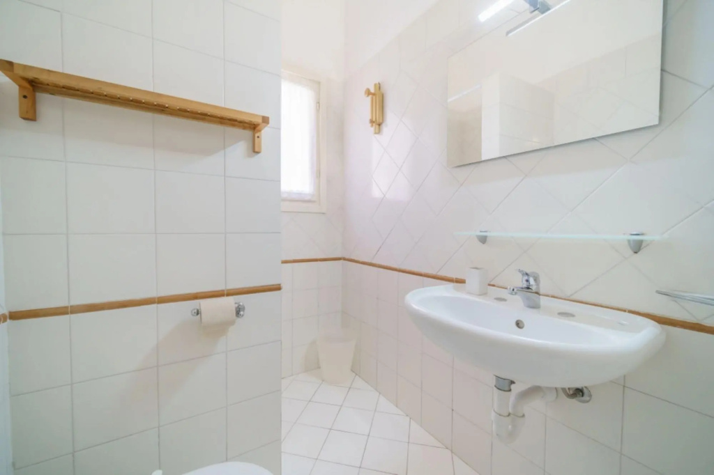 Baia Blu 1 in a small complex of colourful houses that directly overlooks the beach of Forno.-BAIA BLU N°1