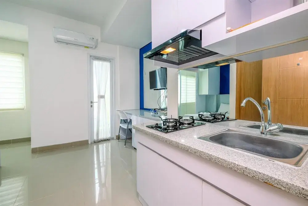 Elegant Studio Apartment at B Residence near AEON Mall By Travelio
