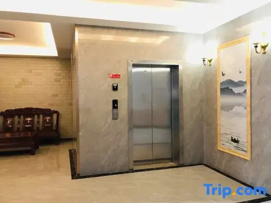 Pingle Xingfu Hotel