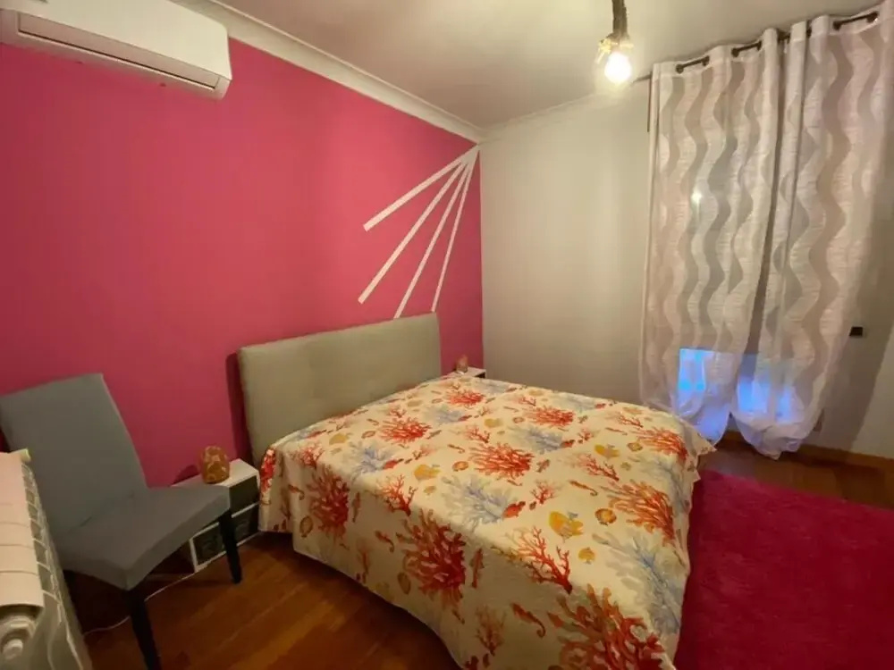 Room in Guest Room - Camera Rosa Appartamento Quadrifoglio