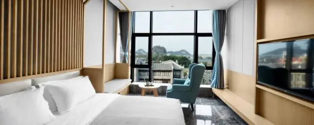 Guilin Gangshe Hotel East&West Alley