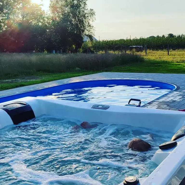 Apartamenty Wilga - spokojne miejsce z całorocznym zewnętrznym wspólnym jacuzzi, sauną i letnim basenem