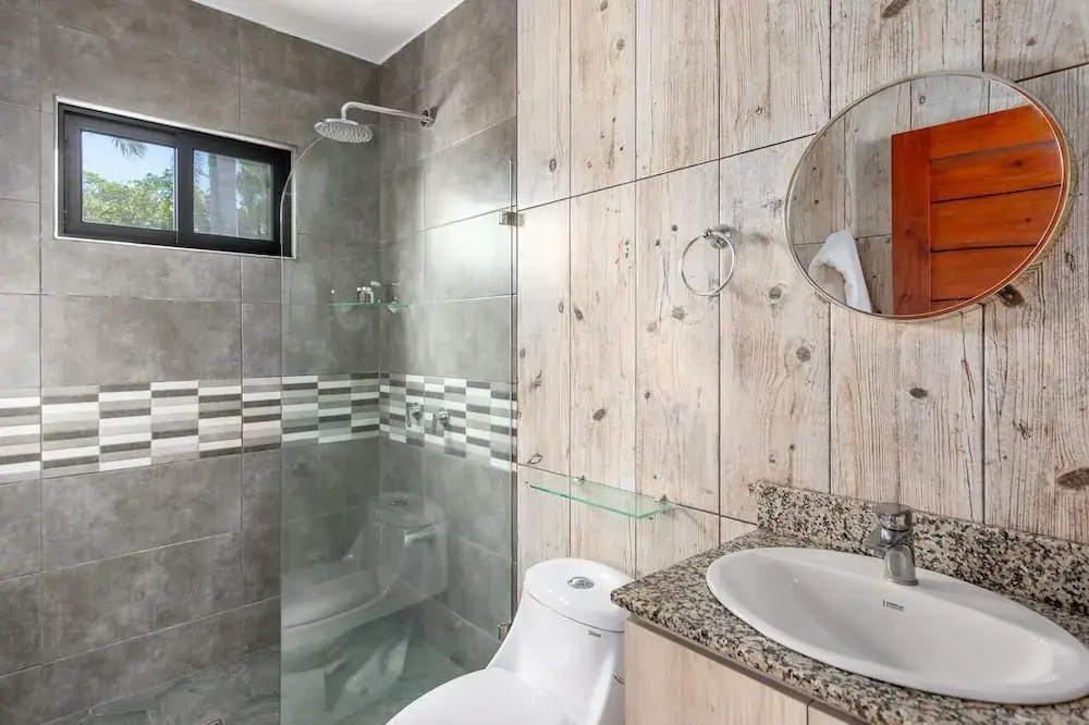Ultramodern Townhome with an Inviting Coastal Design and Lush Outdoor Oasis with a Private Pool
