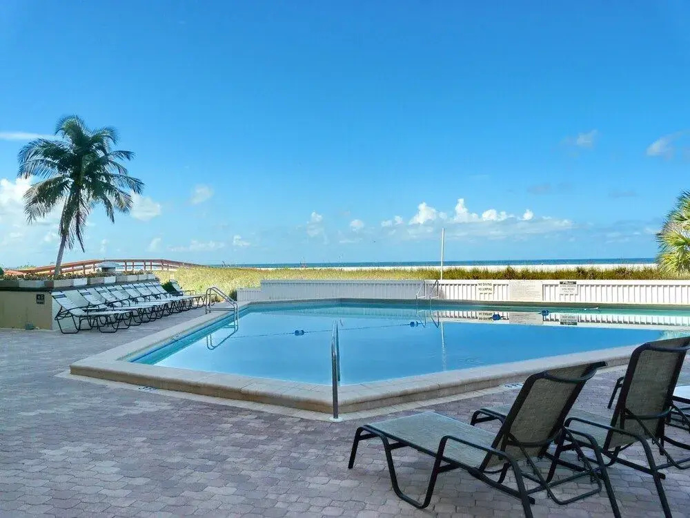 Inviting Beachfront Condo With Large Balcony and Pool