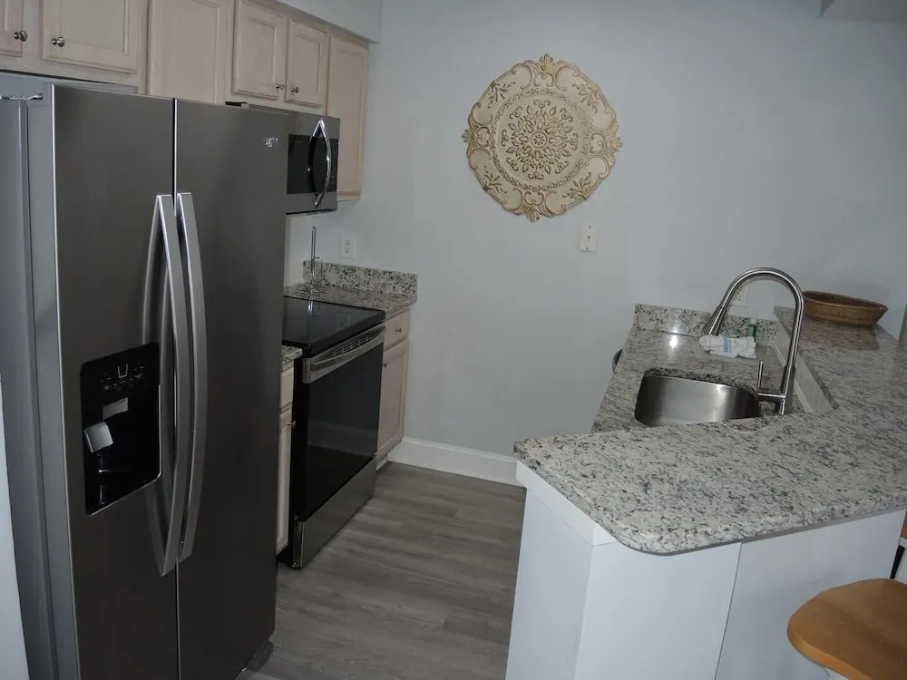 Brunswick Plantation Resort and Golf Condo 307M with Outdoor Pool by RedAwning