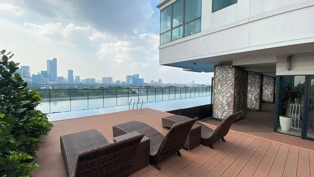 Modern and New 1BR across LRT Station Samara Suites Apartment