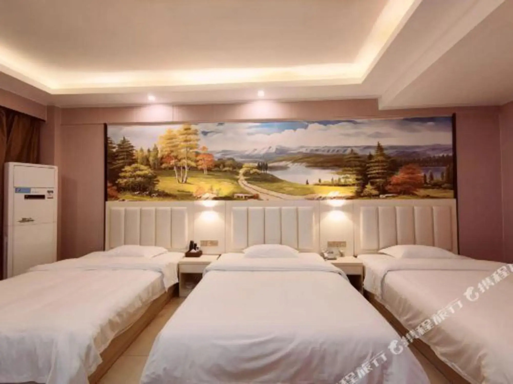 Youge Shangpin Hotel (Xinxing Times Square Bus Station)