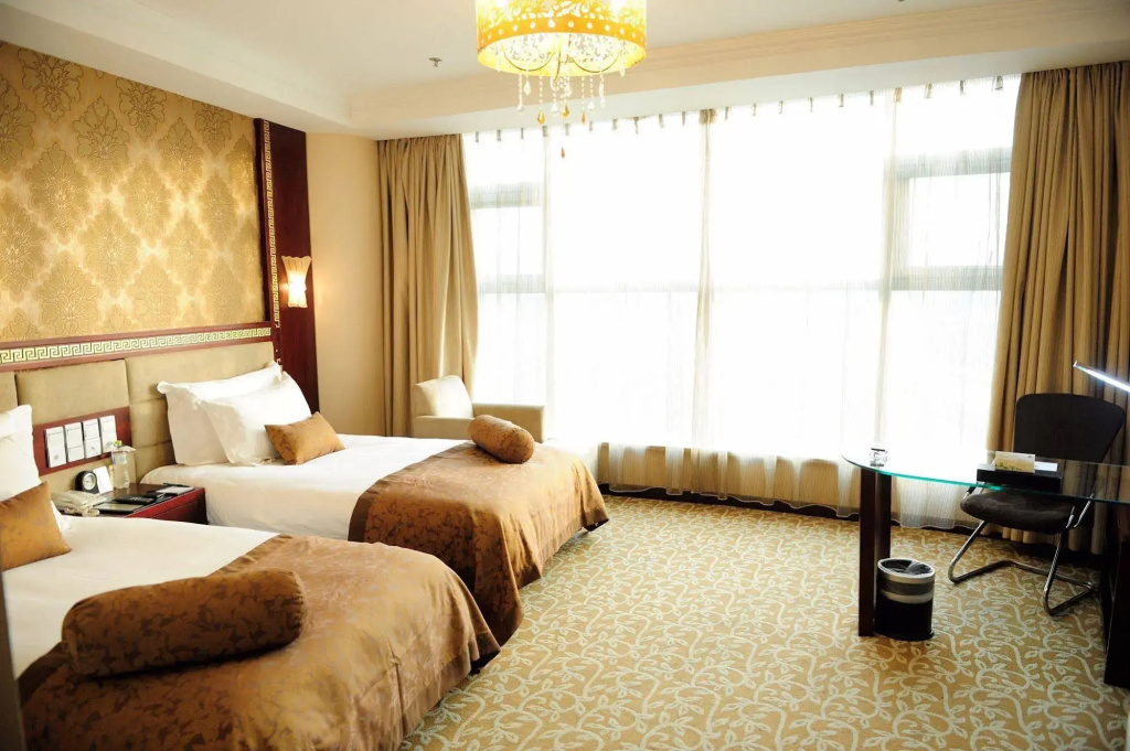Vienna International Hotel Shandong Yantai FTA Jinshatan Xingyi Square