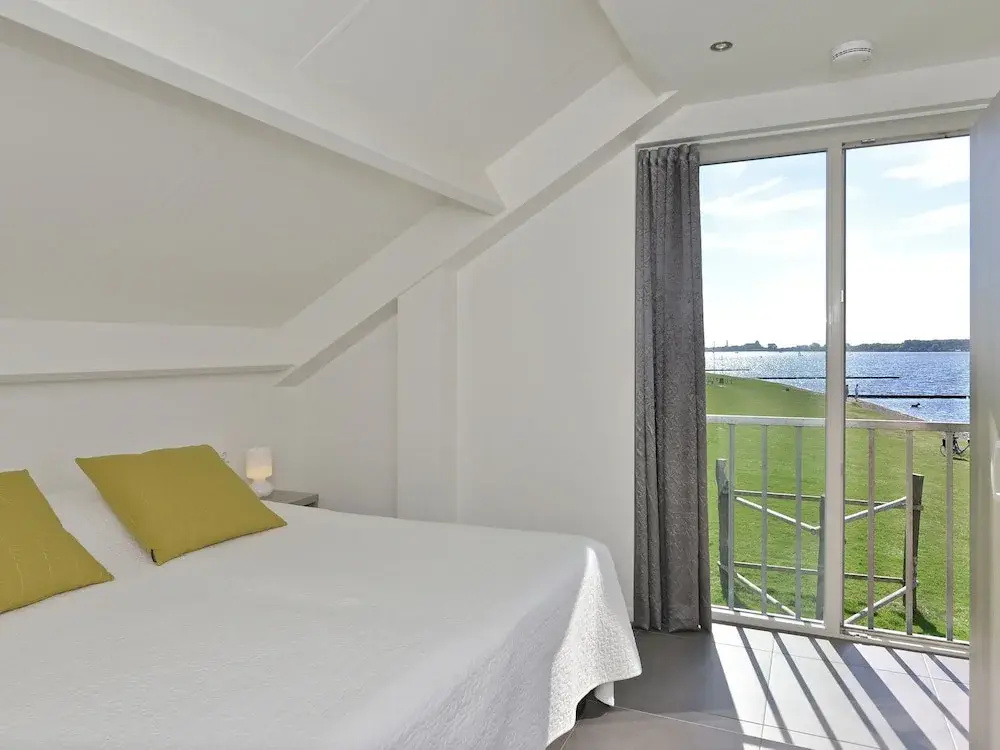 Waterfront penthouse with roof terrace and private jetty