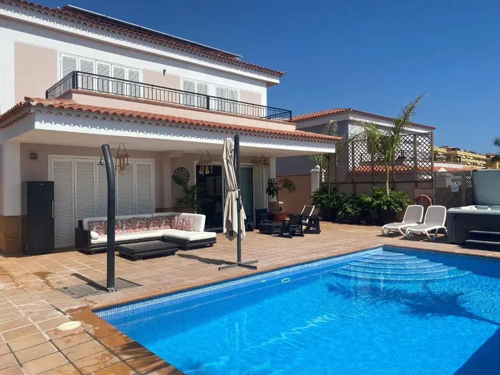 VILLA BLOSSOM in the beautiful area of Puerto Santiago Tenerife with 5 bedrooms for up to 10 guests private swimming pool and many other activities to entertain the family Secure parking for 2 cars and disabled access throughout