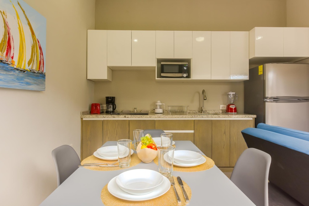 Fascinating Beautiful Apartment | Playa del Carmen | Lounge Area, Rooftop Pool & Sunbeds
