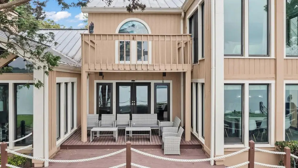 Waterfront Stay w/ Canoes, Deck, Game Room & Lake Views Near Mooresville Renwick Cove by Avantstay