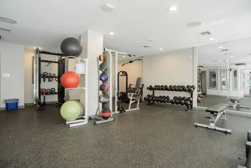 Modern Condo With Pool, Gym, Workspaces & BBQ