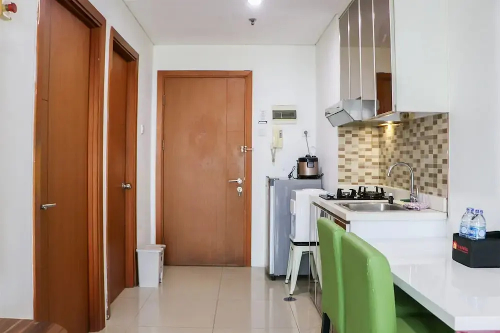 Great Location and Comfy 1BR Apartment at Woodland Park Residence By Travelio