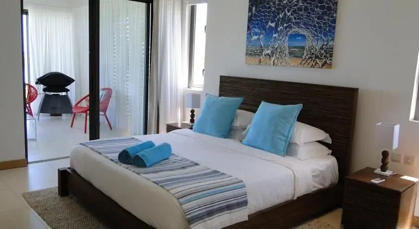 Cap Ouest Beachfront Residences