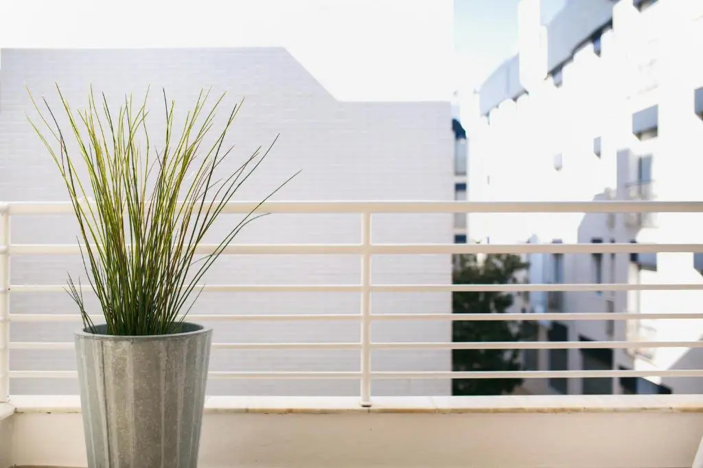 Lets Holidays White Apartment with Terrace, AC & Parking, Near Beach
