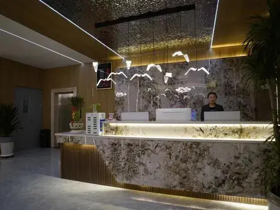 Guyuan Woju Apartment Hotel