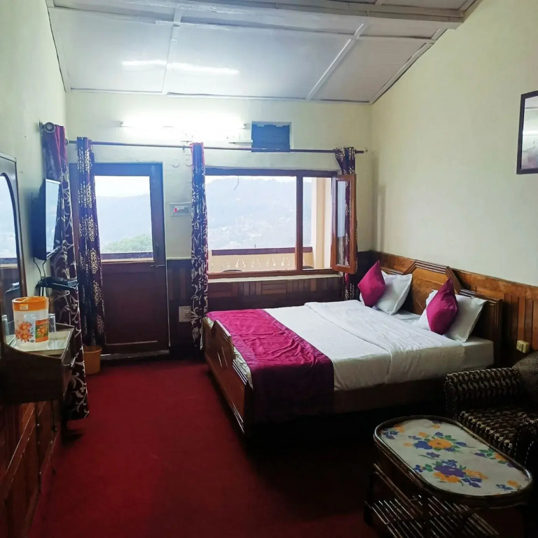 Tribhuvan Ranikhet by Goroomgo