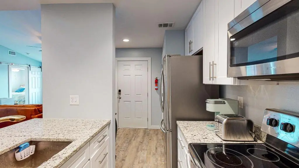 AH-E217 Remodeled Second Floor Condo, Across From The Shared Pool & Hot Tub