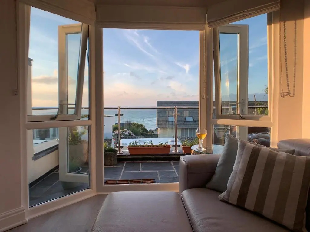 SEA BEACH & COASTAL VIEWS from LRG SUN TERRACE G Bay Apartments OVERLOOKS FISTRAL BEACH MOST DESIRABLE LOCATION SLEEPS & DINES 6 which includes SOFABED 2 BATHROOMS AL FRESCO Dining Smart tv all rooms PRIVATE PARKING 2 CARS sat-sat only April-Nov please