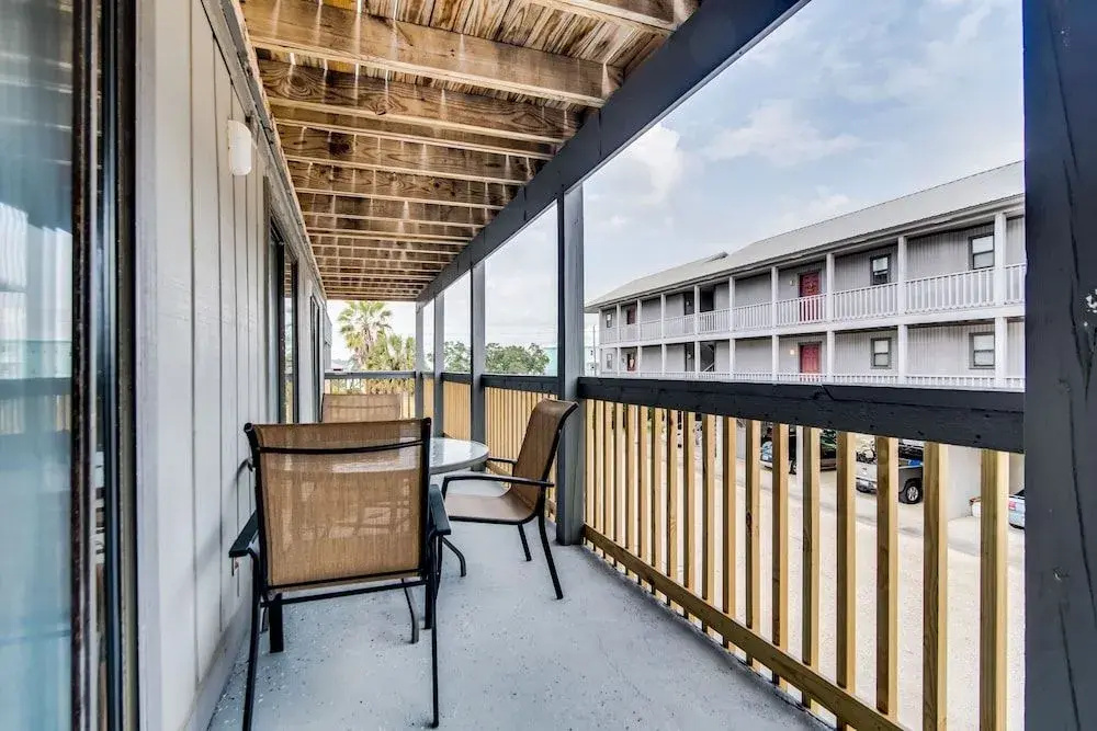 Sandy Shores West Unit 202 by RedAwning