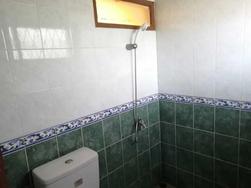 Hotel O Wisma Deli Syariah Near RSUD Nene Mallomo Sidenreng Rappang