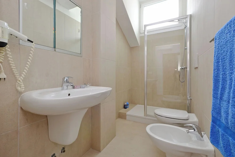 Charming Retreat Just Steps From the Beach