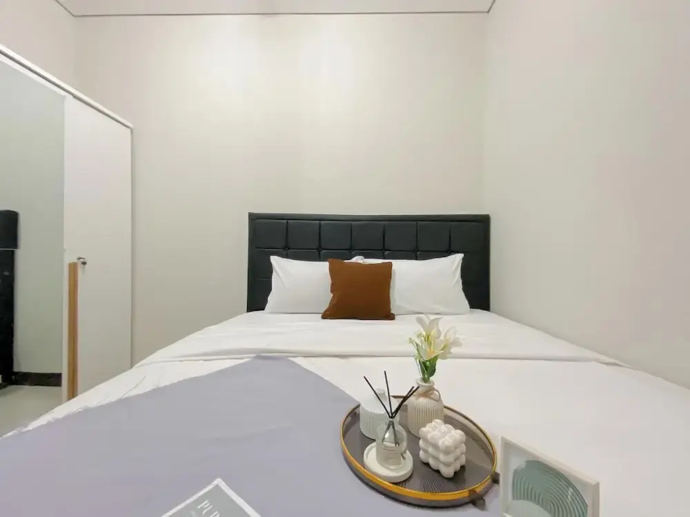 Brand New and Homey 2BR Apartment at Nifarro Park
