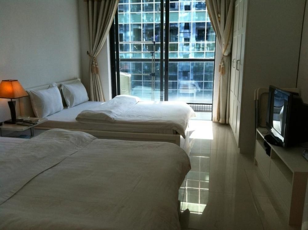 Huamei Apartment Hotel