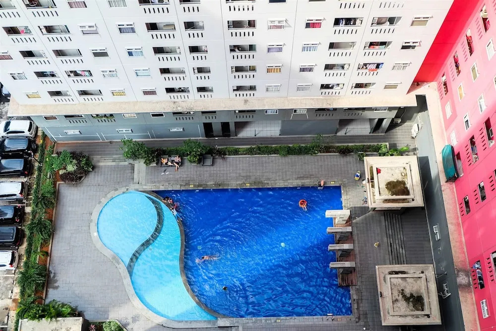 Furnished Green Pramuka 1BR Apartment with Modern Style and City View