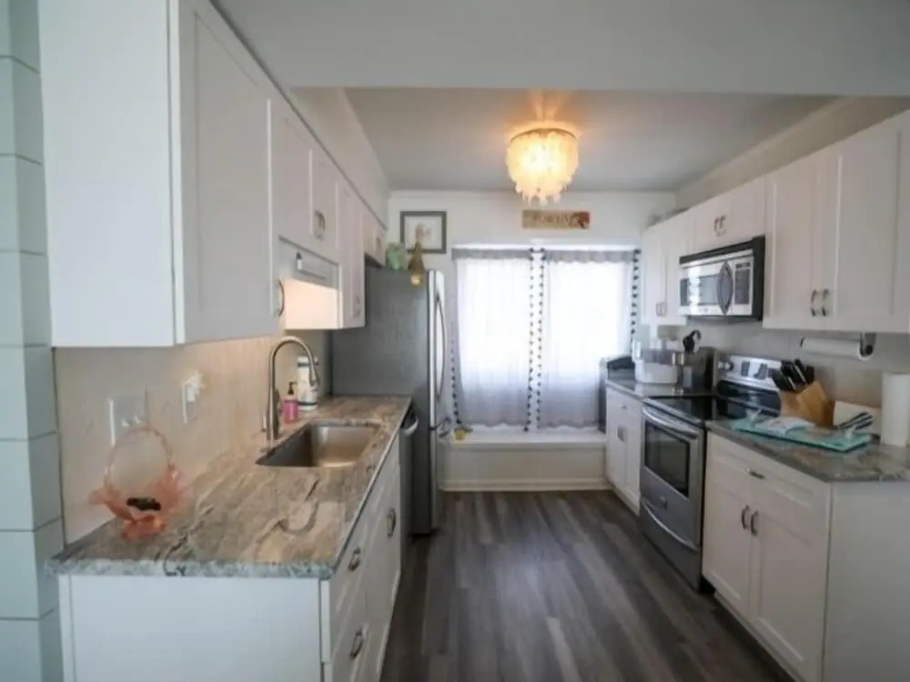 Beach Sunrise - Relaxing and Romantic! Enjoy ocean views from the bedroom with balcony access. 1 Condo by RedAwning