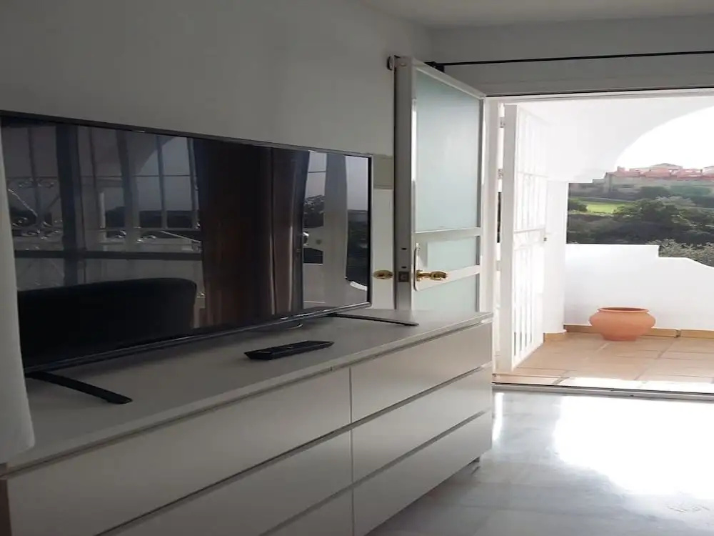 Sunny and spacious apartment with own entrance to pool