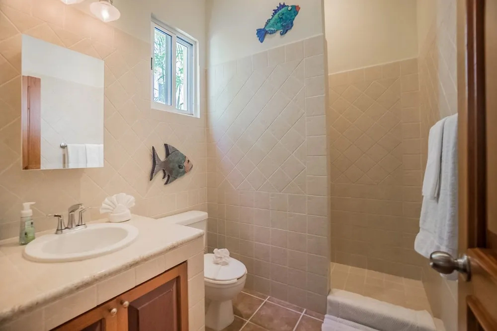 Romanina 1 Condo in the Heart of Playa del Carmen by RedAwning