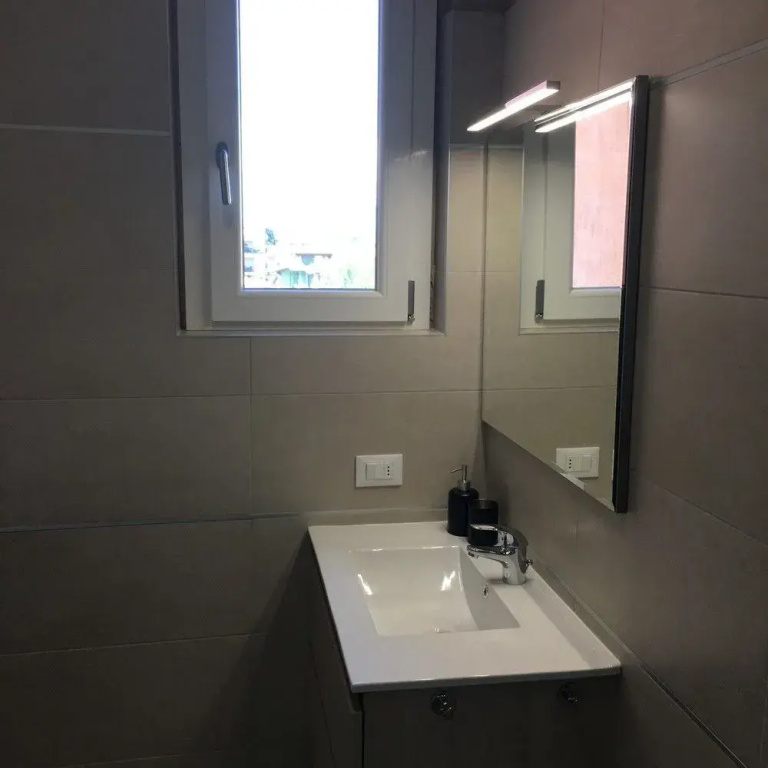 Smiling in Desenzano Lake View DesenzanoLoft Official Partner Homes & Villas by Marriott Bonvoy