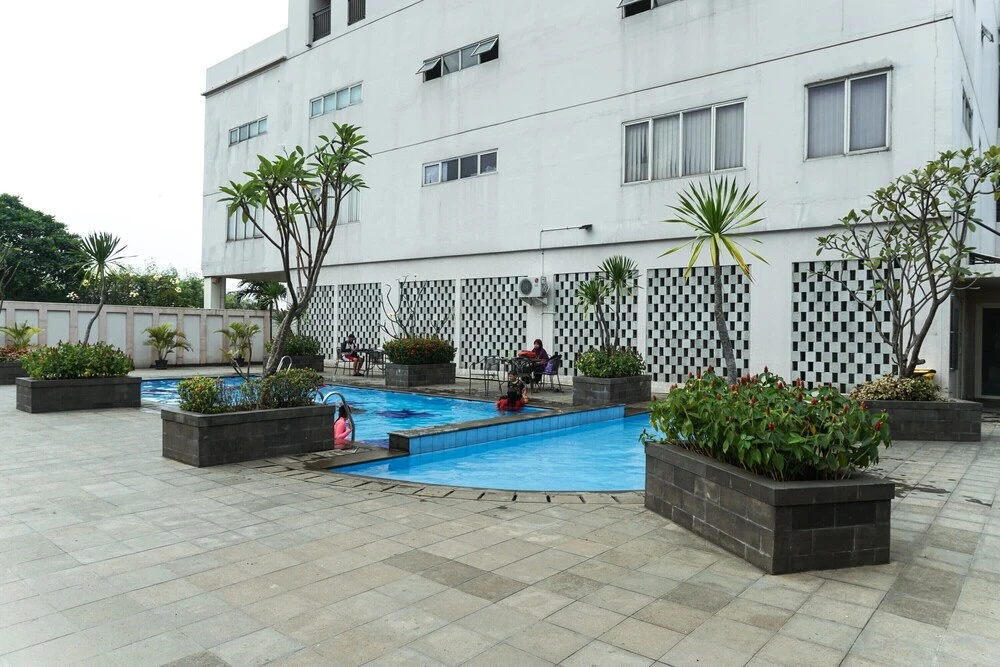 Elegant Design Studio Apartment at Margonda Residence 4 By Travelio