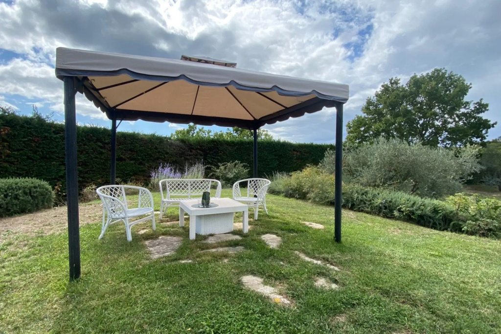 Podere Sassolegno is a uniquely charming house where you can happily spend time relaxing in the gard-Podere Sassolegno