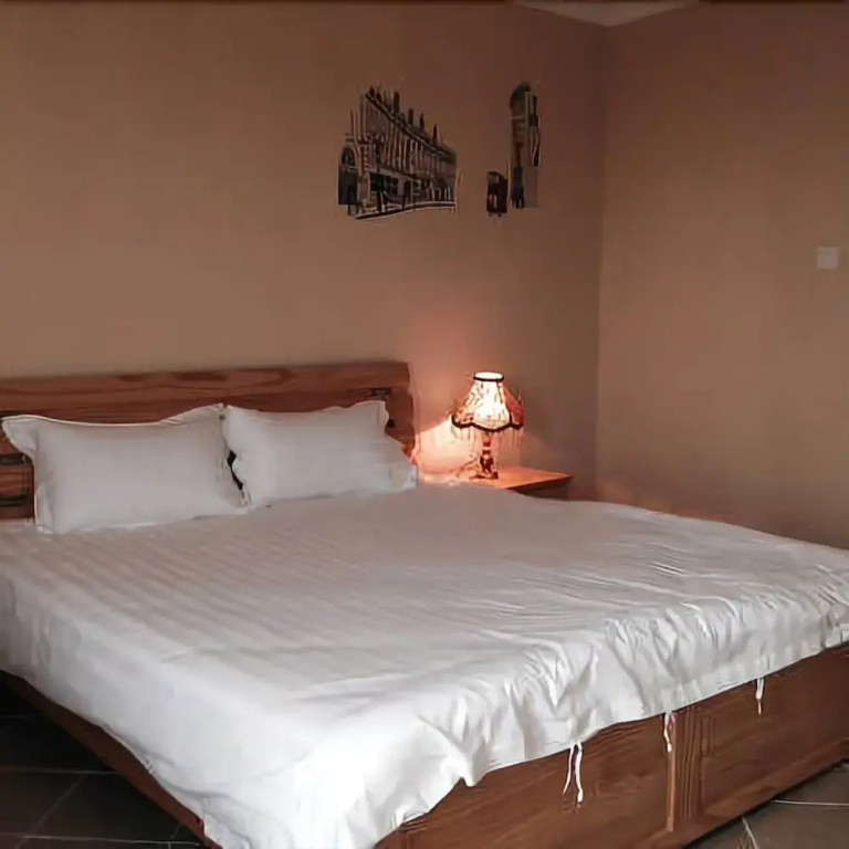 Yueming Holiday Apartment Hotel