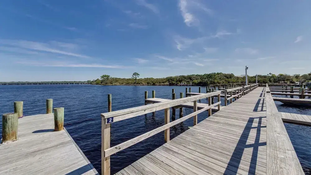 Beachfront Charm Meets Lake Life + Free Tickets: Dolphin Cruise & More!