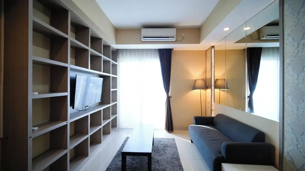 Modern and Cozy 1BR at Grand Sungkono Lagoon Apartment By Travelio