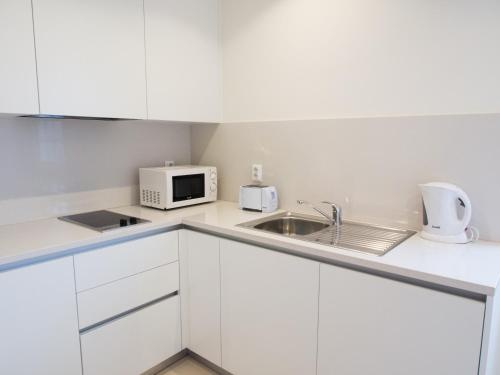 Belomont6 Apartments