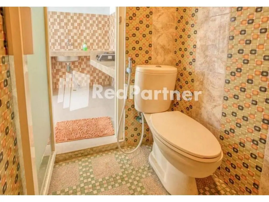 Griya Rahayu Guesthouse Mitra RedDoorz near Jatim Park 2 Batu