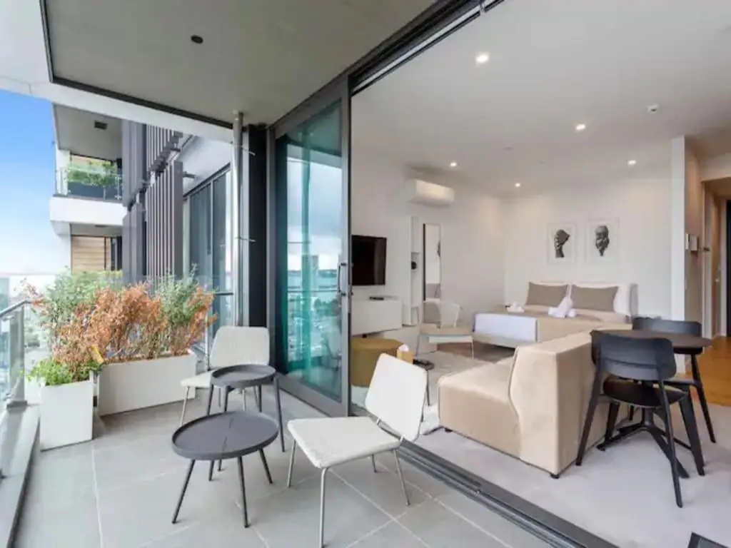 Sleek Modern Studio with Balcony by Zodiak Stays