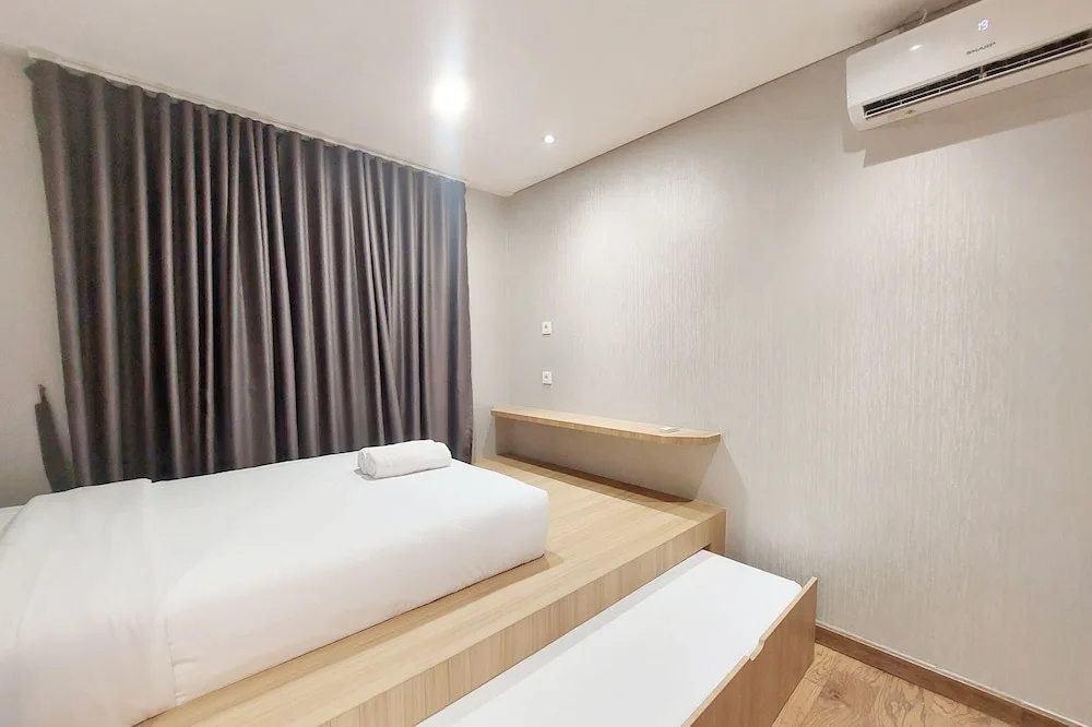 Brand New and Nice 2BR Apartment at The Reiz Condominium Medan By Travelio.