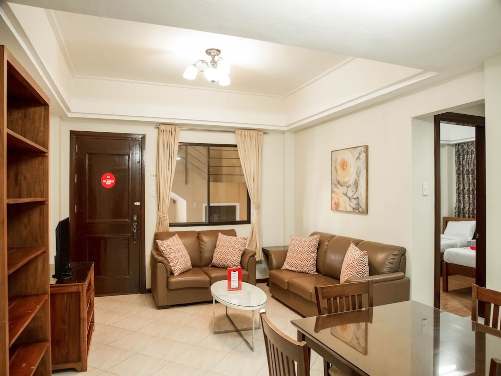 Oyo 211 las Palmeras Apartelle