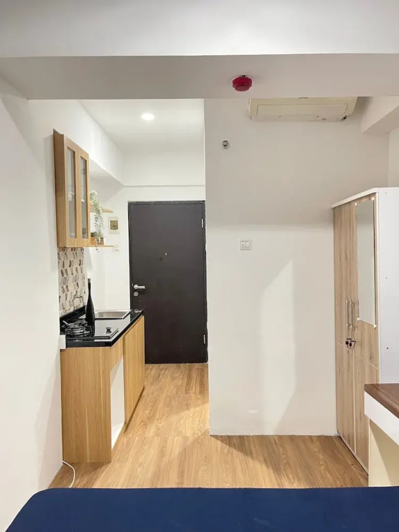 Comfy Studio Apartment at Grand Asia Afrika By Travelio