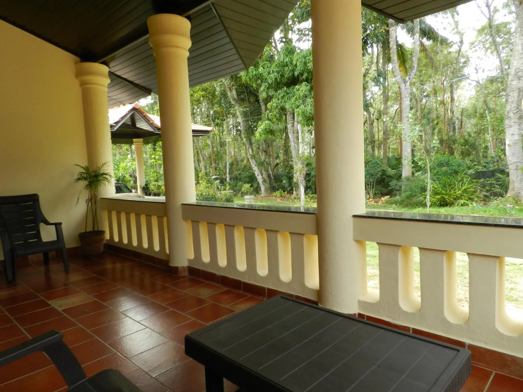 SaffronStays Calamondinn Bungalow - 5BR Colonial Heritage Home within Coffee Plantation in Coorg