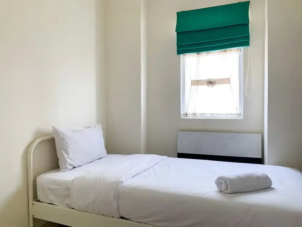 Modern Look And Comfortable 2Br Green Pramuka City Apartment