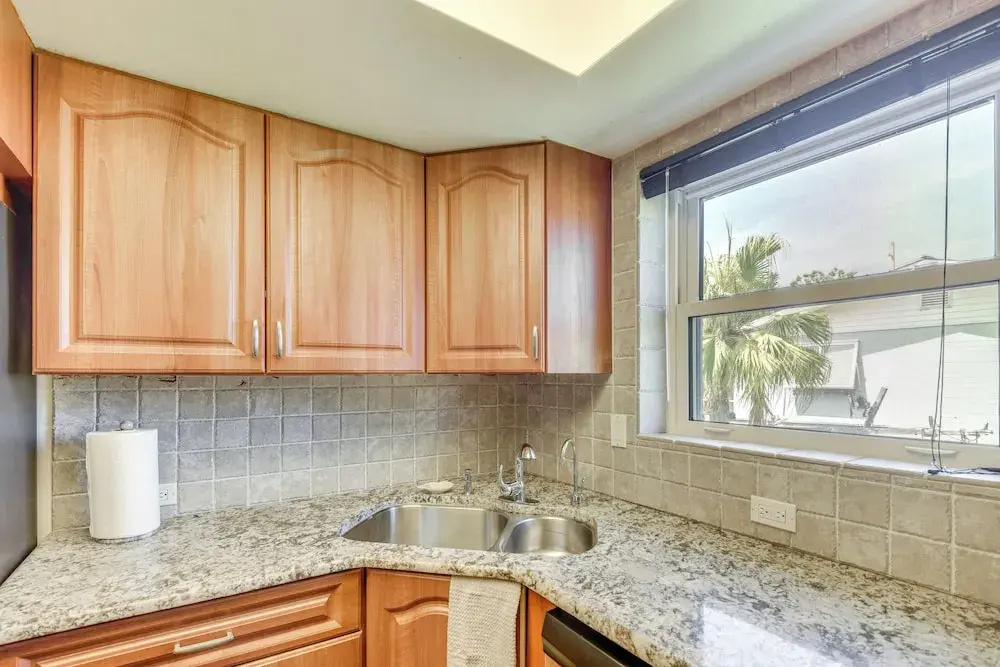 Sunny South Daytona Home w/ Pool & Grill!