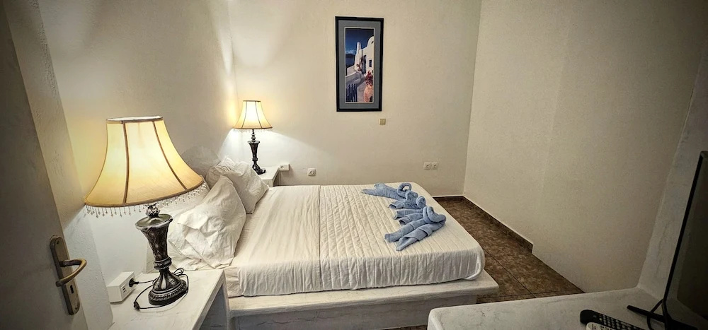 Santorini Studios Pleasure By The Sea