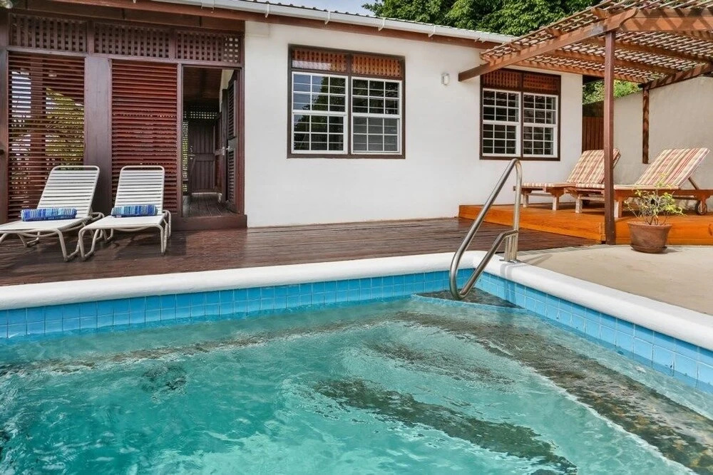 Charming Cottage Located In Cap Estate - Orchid Cottage 1 Bedroom Home by RedAwning